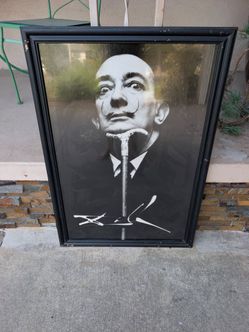 Salvador Dali's Framed Print Of Him Resting His Head On A Cane