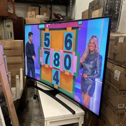 67 inch curved TV with remote Samsung