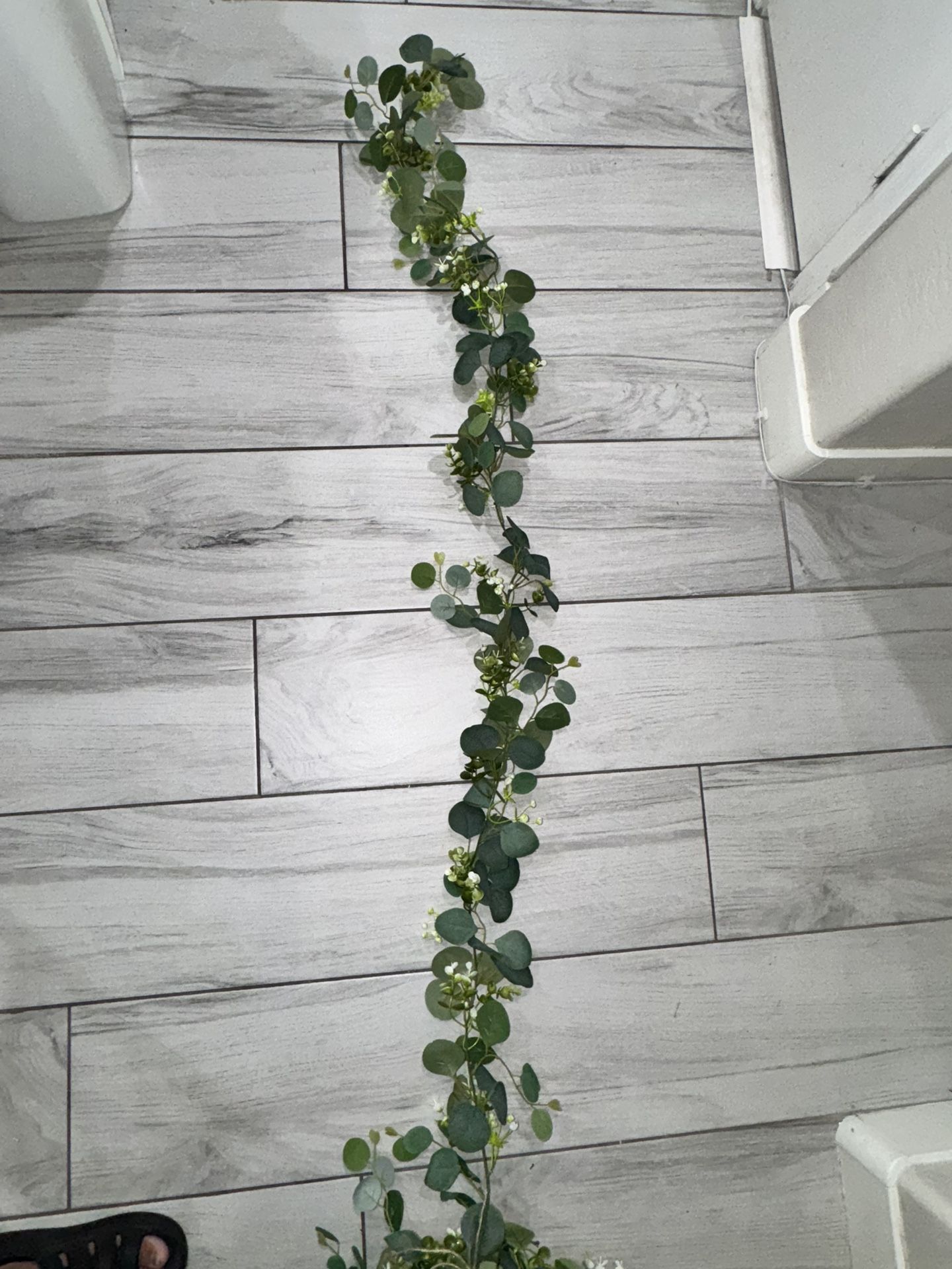 10 - Eucalyptus Vine With Baby’s Breath Flowers