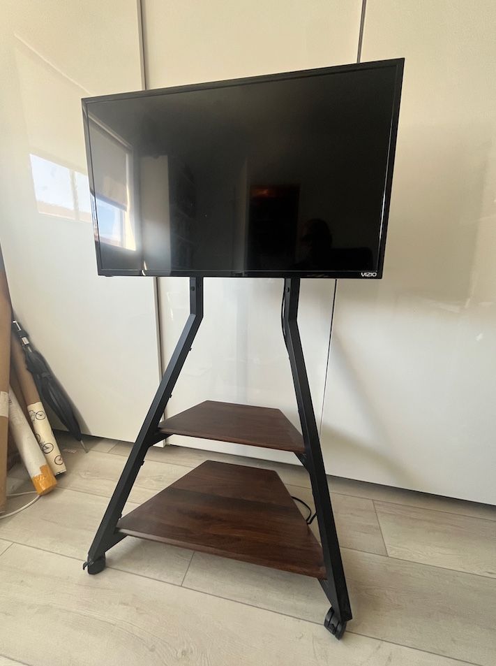VIZIO 32 inch Smart LED HDTV with Corner Rolling TV Stand.
