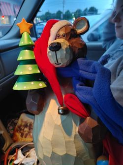 Carved wooden bear with wood chrisas tree and bag of carved toys very good quality