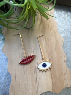 Pendientes Asimétricos