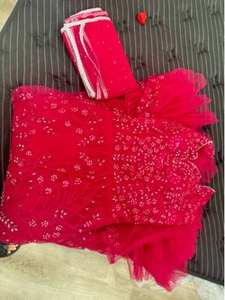 Pink embellished gown with drape