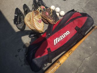Catchers glove and Glove plus a practice assorted items for baseball