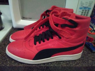 Brand new never worn puma leather hi tops size 11