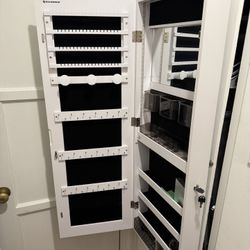 Jewelry storage mirror