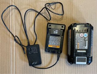 Used Ryobi battery + charger