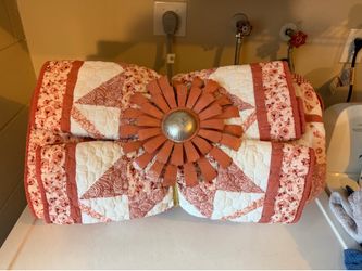 Gently used king comforter, quilt, and two shams plus matching metal wall  decor flower