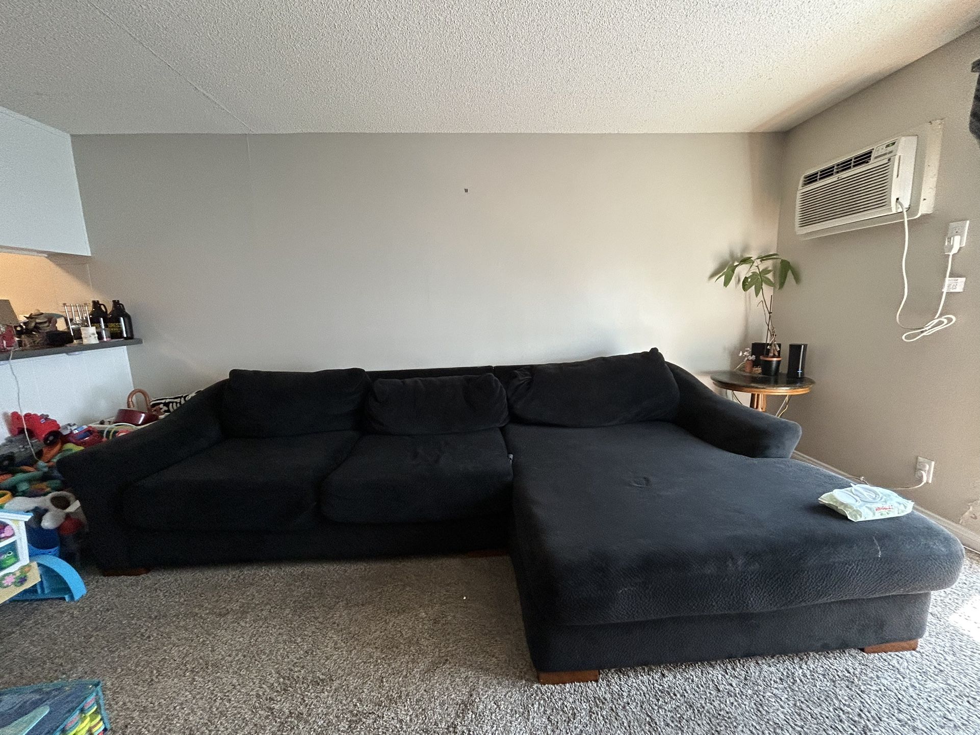BLACK OVERSIZED COUCH NEED GONE TODAY