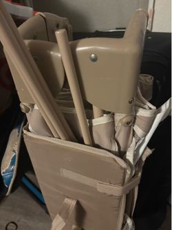 Portable folding playpen