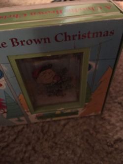 Charlie Brown book with orament