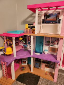 Barbie Dream House and Barbies $100 OBO