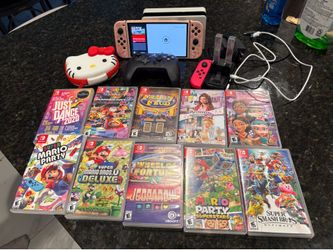 Nintendo switch oled w 10 games & 2 extra controllers