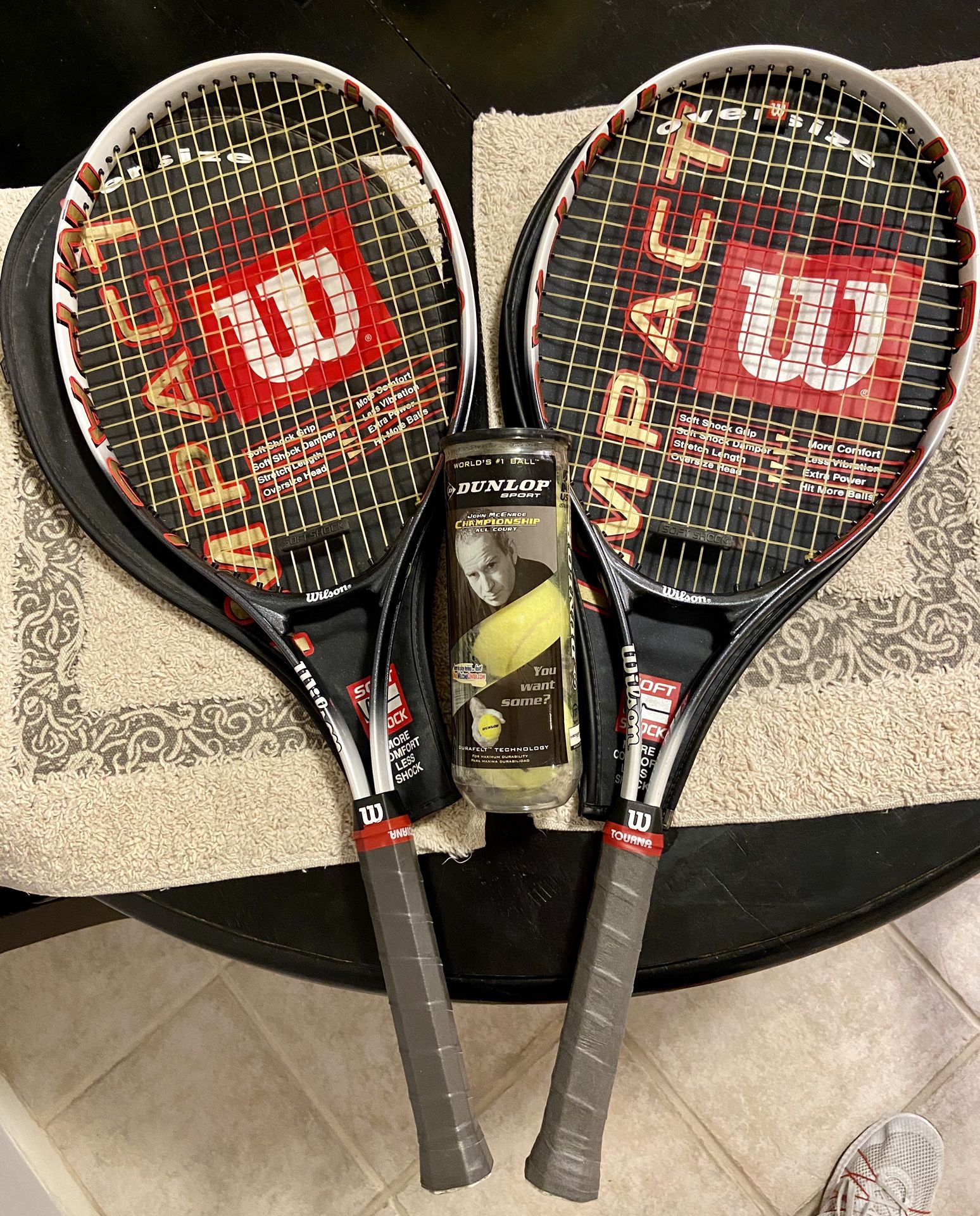 2 Wilson Tennis Rackets (w/ Wilson covers, new grips & 1 new/unopened can of tennis balls)