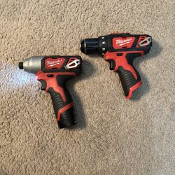 Milwaukee cordless drill and impact gun set
