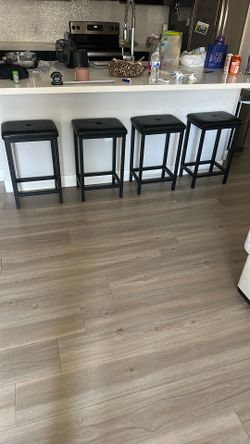4 black counter-height bar stools
