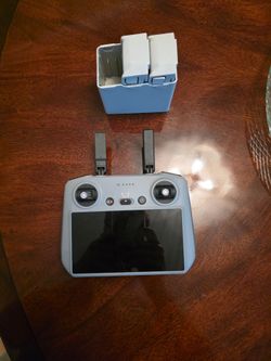 Dji remote, 2 batteries, charger from mini pro 4