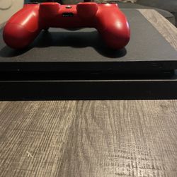PS4 with Red Controller – Great Condition!