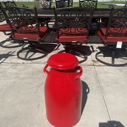 red vintage milk can approximately 23 inches 