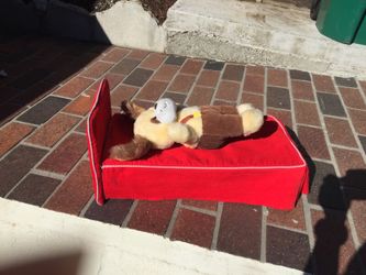 Wooden toy bed with bear