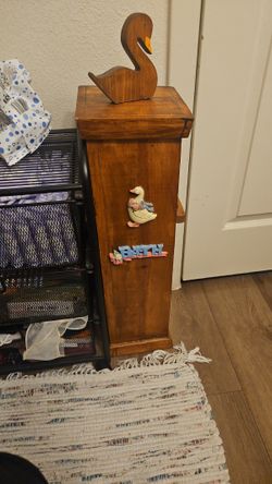 vintage toilet paper storage cabinet