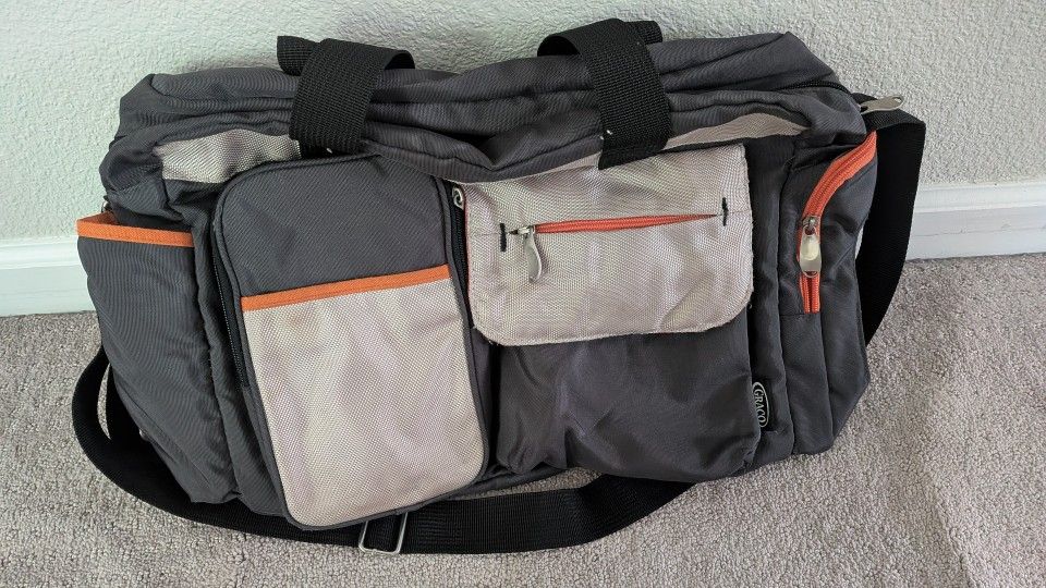 Graco Diaper Bag and Crinkle cloth books