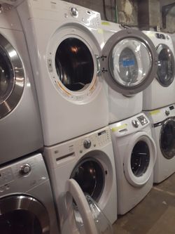 LG front load washer and electric dryer set working perfectly with 4 months warranty
