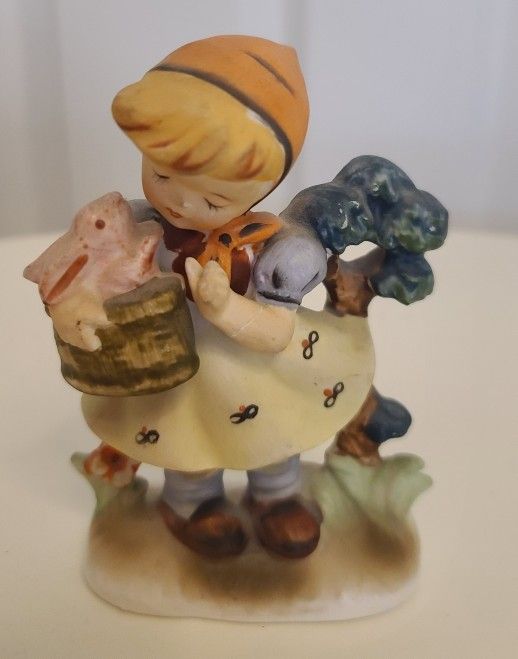 Vintage Wales Japan Girl with Rabbit in Basket Figurine.
Knick Knack.