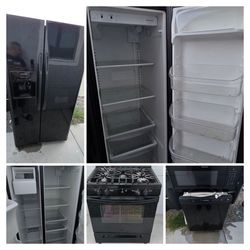 Frigidaire fridge, microwave, gas stove and dishwasher