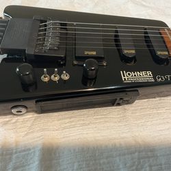 1980’s Hohner G3-T Headless Guitar. Great sounding portable guitar in very nice condition. Electronics work great and very little fret wear. Could use