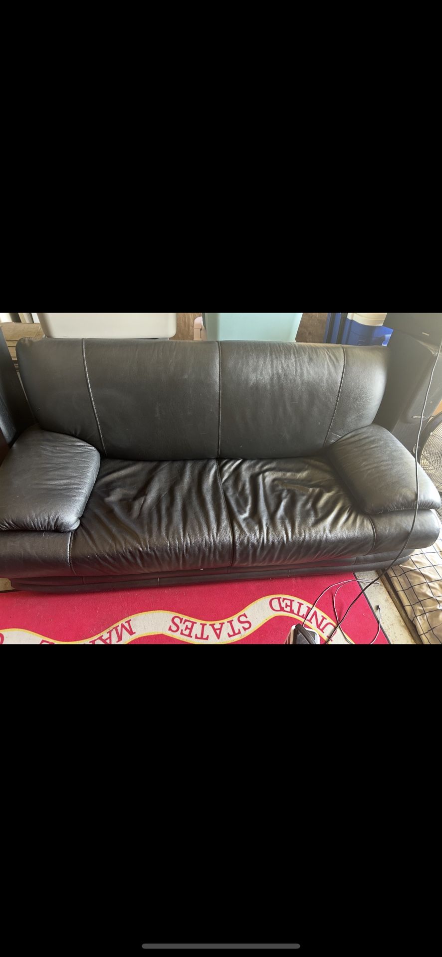 Black Leather Couch With Wheels