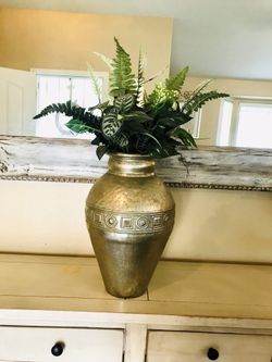 Vase and greenery