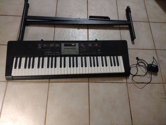 Casio Electronic Keyboard with Stand and Adapter