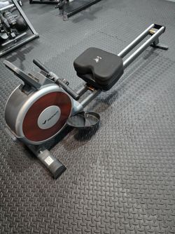 exercise rowing machine, inverted table and office chair