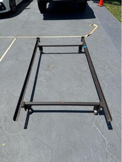 Black snap on twin size metal bed frame good condition