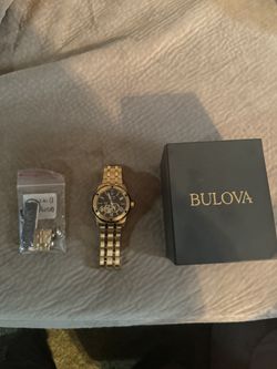 Black And Gold Bulova Watch 