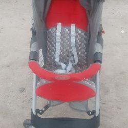 Red And Gray Graco Stroller