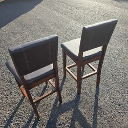(2) Leather look and Wood BarStools 