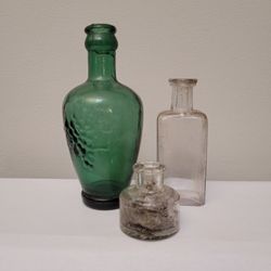 Set of 3 antique glass bottles bud vases