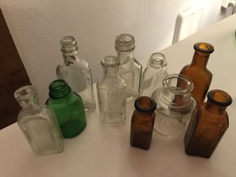Small antique pill bottles