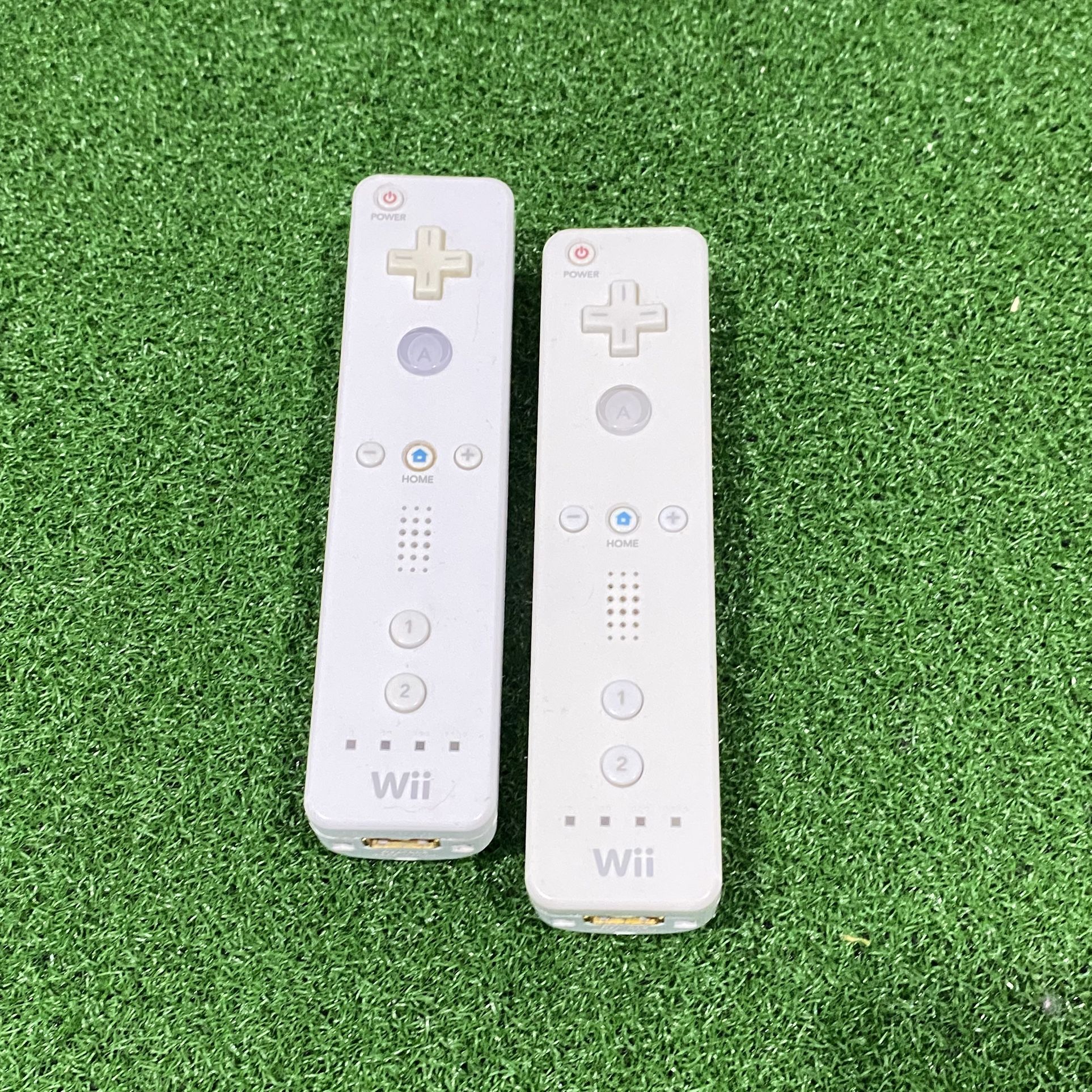 2 Nintendo Wii Remotes