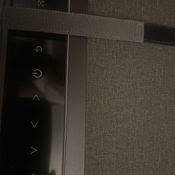 Touch screen smart projector with ambient lighting remote cable inside