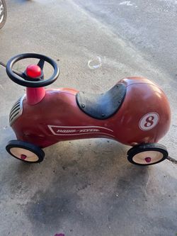 Vintage metal radio flyer roadster car