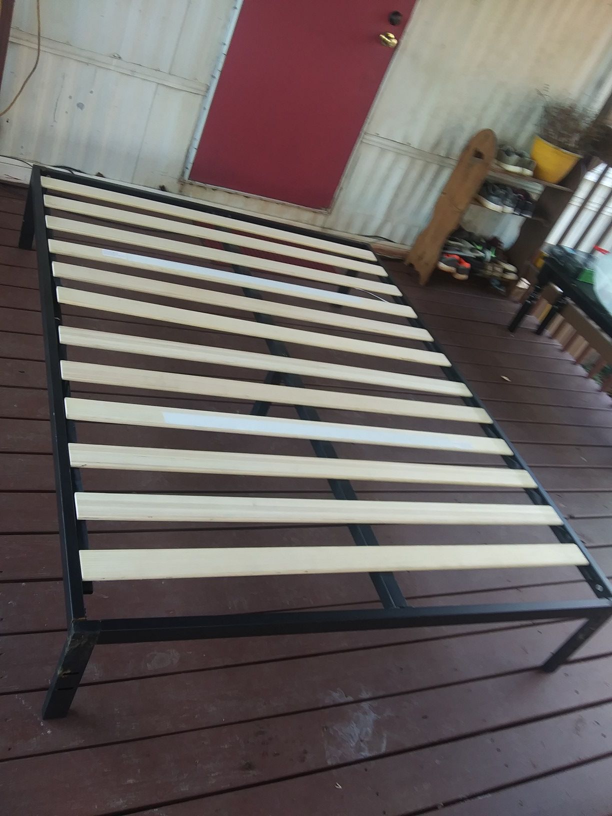 Queen bed frame new condition