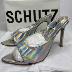 Leather sole with rubber heel cap  SCHUTZ Women's Rayne Heels  Metallic finish Heel: 4in / 100mm Stiletto heel Open toe