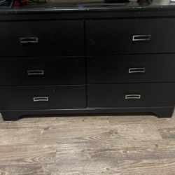 Black dresser with silver hardware 