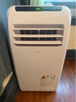 SereneLife 10,000 BTU Portable Air Conditioner with built-in dehumidifier.