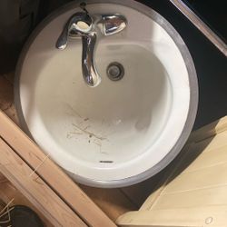 Sink And Delta Faucet. 