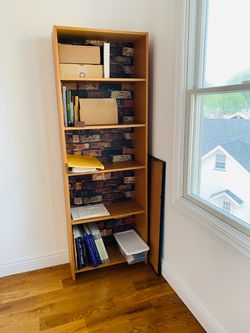 Bookcase/Shelf Unit. Very capacious. Like new. Olden bricks pattern background. 71.25” tall. 24.75 x 9.75”. $49 OBO. Great bargain.