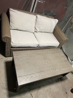Outdoor table and armchair